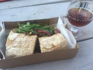 “The Steak” sandwich presentation, along with a red saison brewed by Fiction Beer Co. – New Age Lovecraf’t, a collaboration with Cape May Brewing. After this, I switched to their Dreamer IPA. A fine dry hopped IPA that pairs well with this sandwich and everything else in your life.